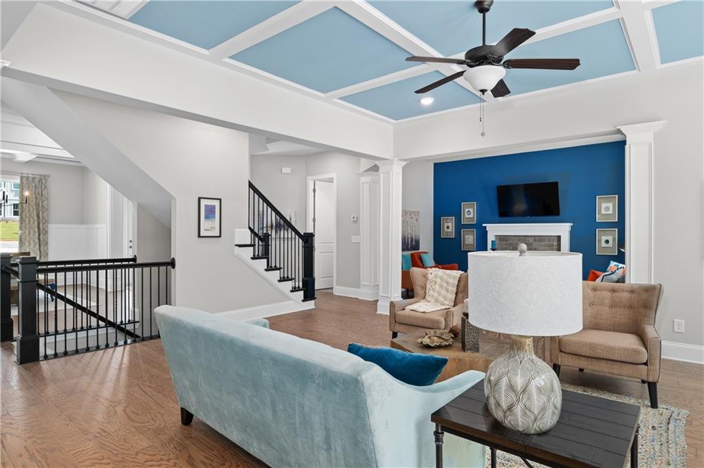3710 Reserve Overlook Way Cumming, GA 30041 - Photo 25 of 98 a living room with furniture and a flat screen tv