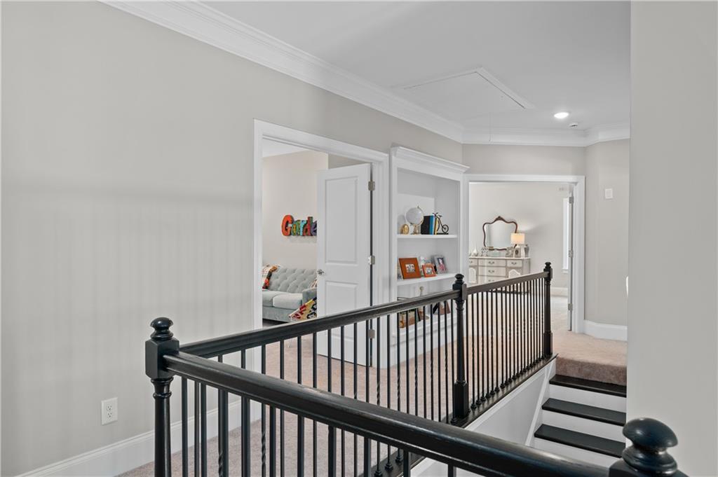 3710 Reserve Overlook Way Cumming, GA 30041 - Photo 36 of 98 a view of a hallway view with staircase