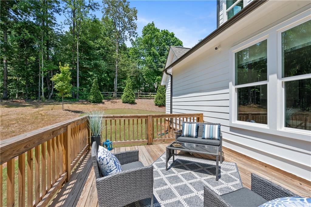 3710 Reserve Overlook Way Cumming, GA 30041 - Photo 59 of 98 a view of a two chairs in the balcony