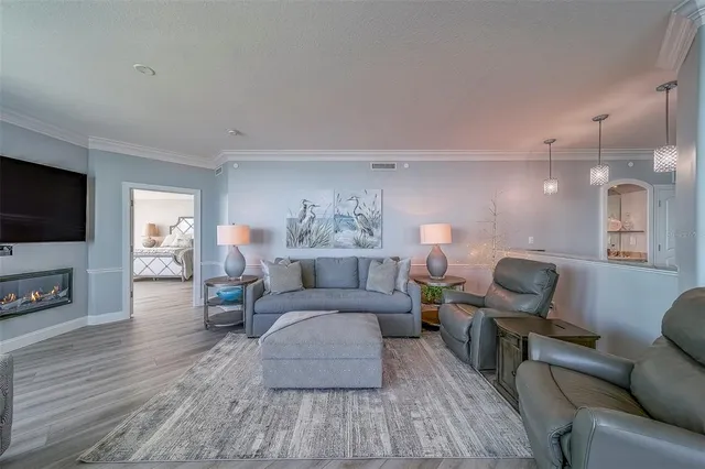 a view of walk in closet with clothes