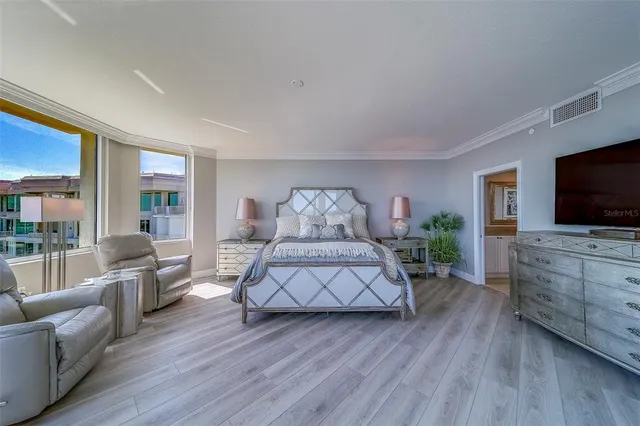 a view of a livingroom with furniture and windows