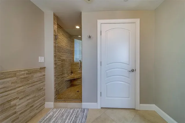 a view of a garden with a building in the background