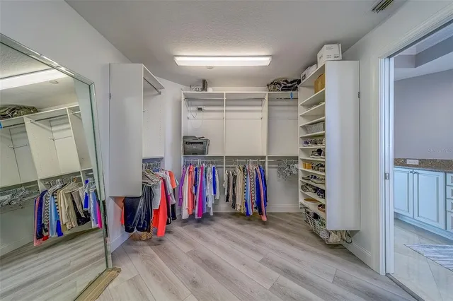 a view of a house with a yard and garage