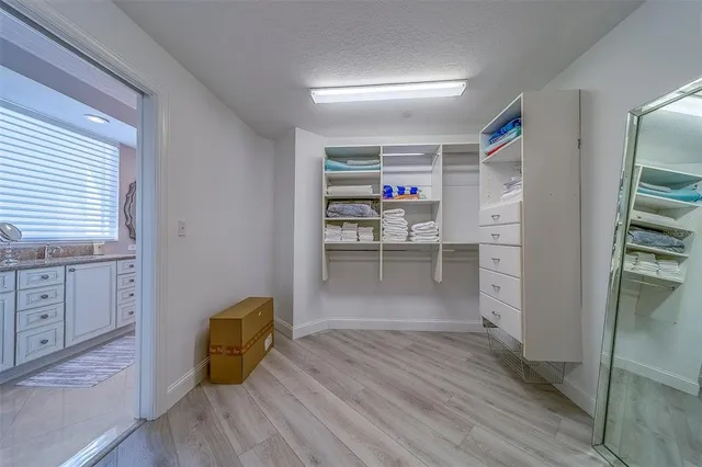 an aerial view of a house with yard swimming pool and outdoor seating