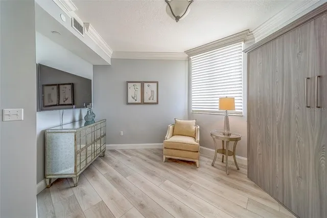 a view of a city with lawn chairs