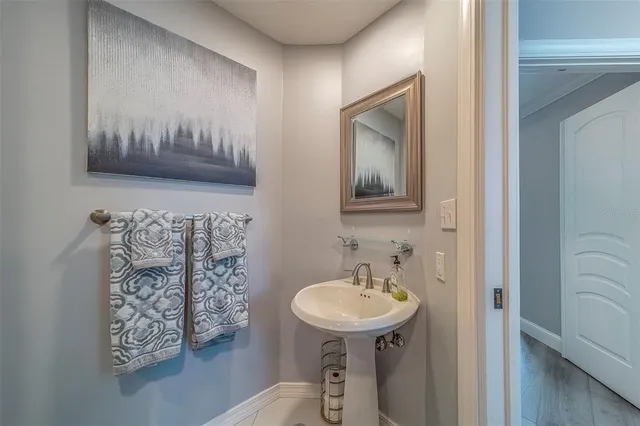 an aerial view of a house with a garden lake view