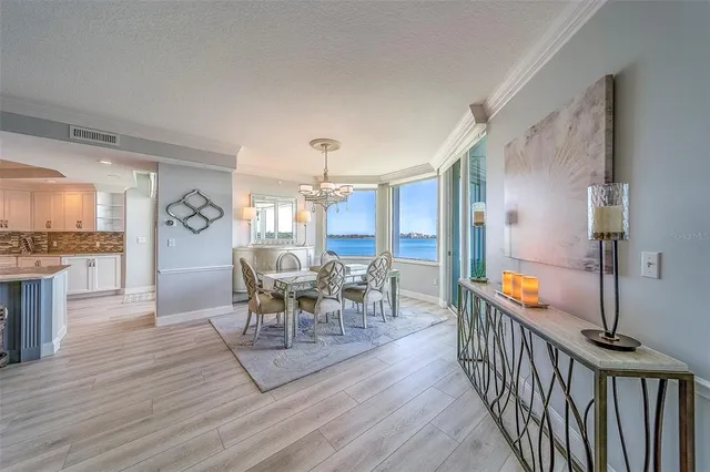 a kitchen with cabinets appliances and a sink