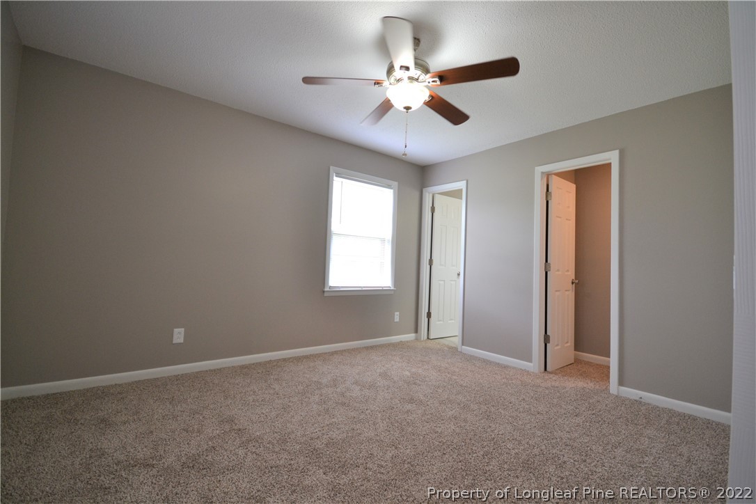 5201 Brookfield Road Fayetteville, NC 28303 - Photo 29 of 45 a view of an empty room with a window