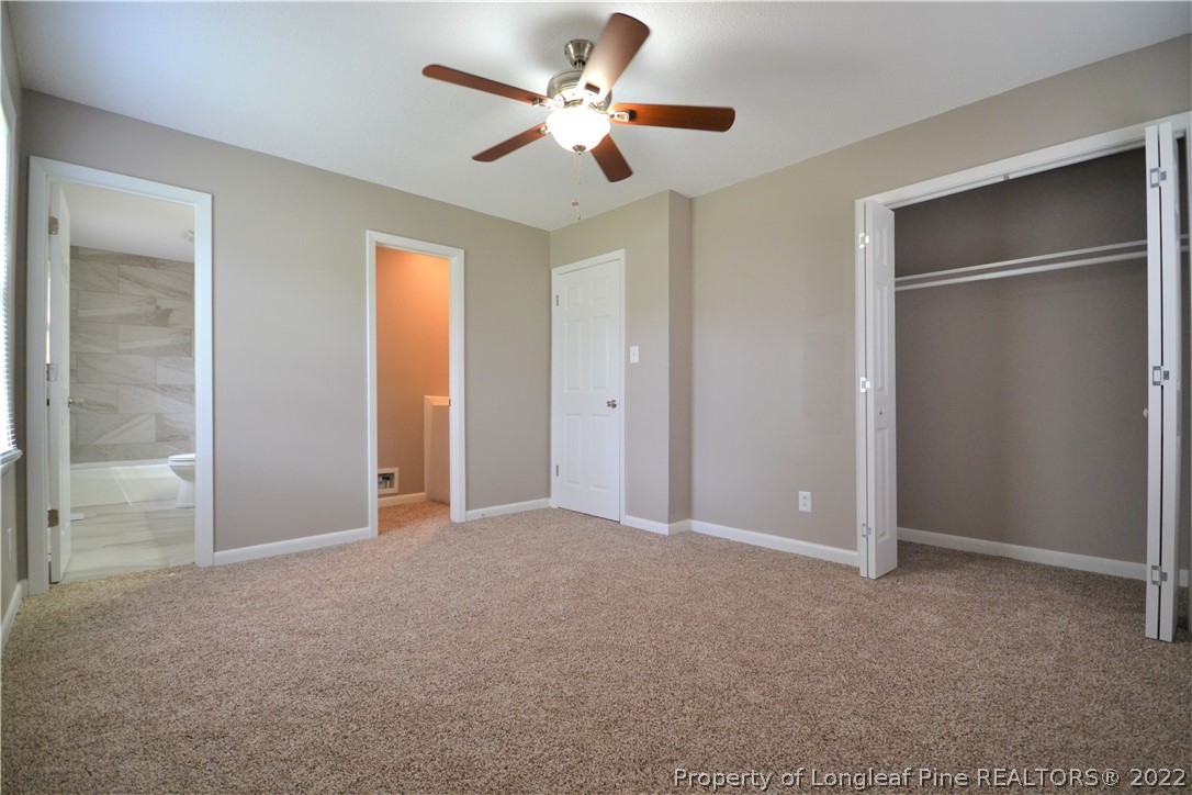 5201 Brookfield Road Fayetteville, NC 28303 - Photo 30 of 45 a view of an empty room with a ceiling fan