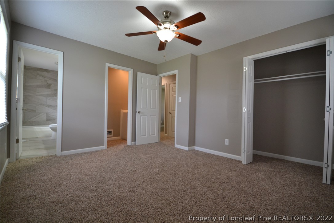 5201 Brookfield Road Fayetteville, NC 28303 - Photo 31 of 45 a view of an empty room with a ceiling fan