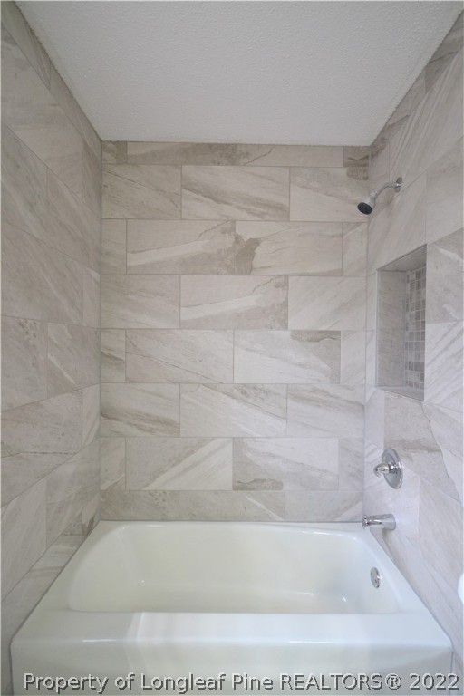 5201 Brookfield Road Fayetteville, NC 28303 - Photo 33 of 45 a bathroom with a bathtub
