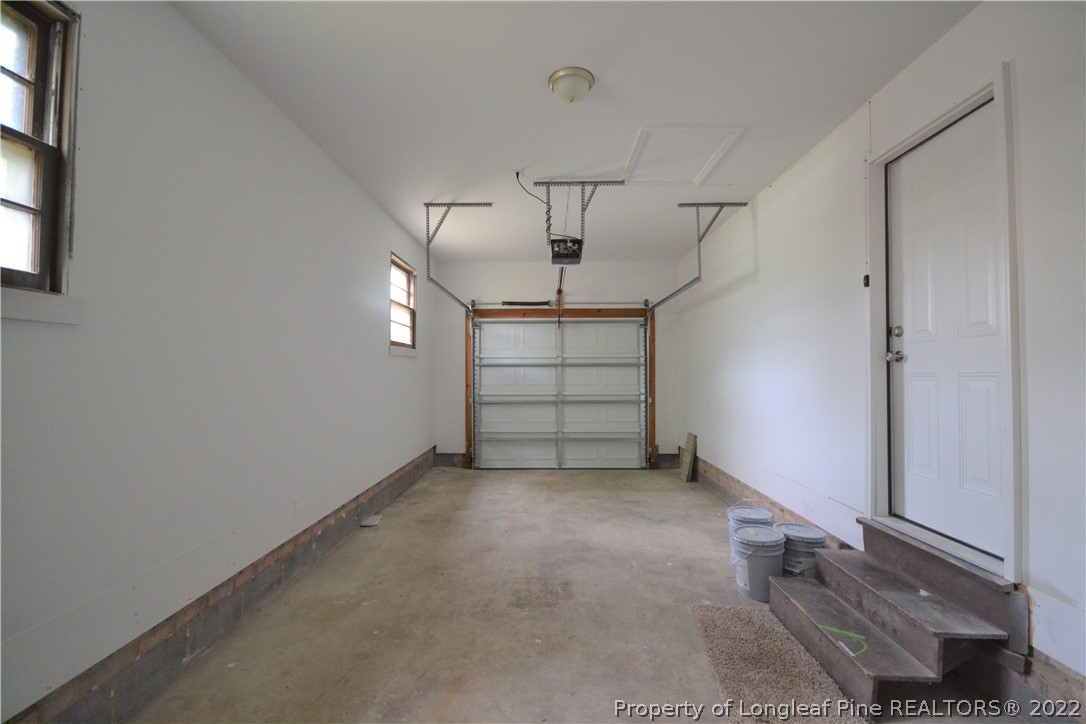 5201 Brookfield Road Fayetteville, NC 28303 - Photo 39 of 45 an empty room with a empty space and windows