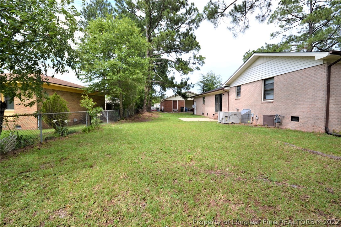 5201 Brookfield Road Fayetteville, NC 28303 - Photo 40 of 45 a view of a house with backyard