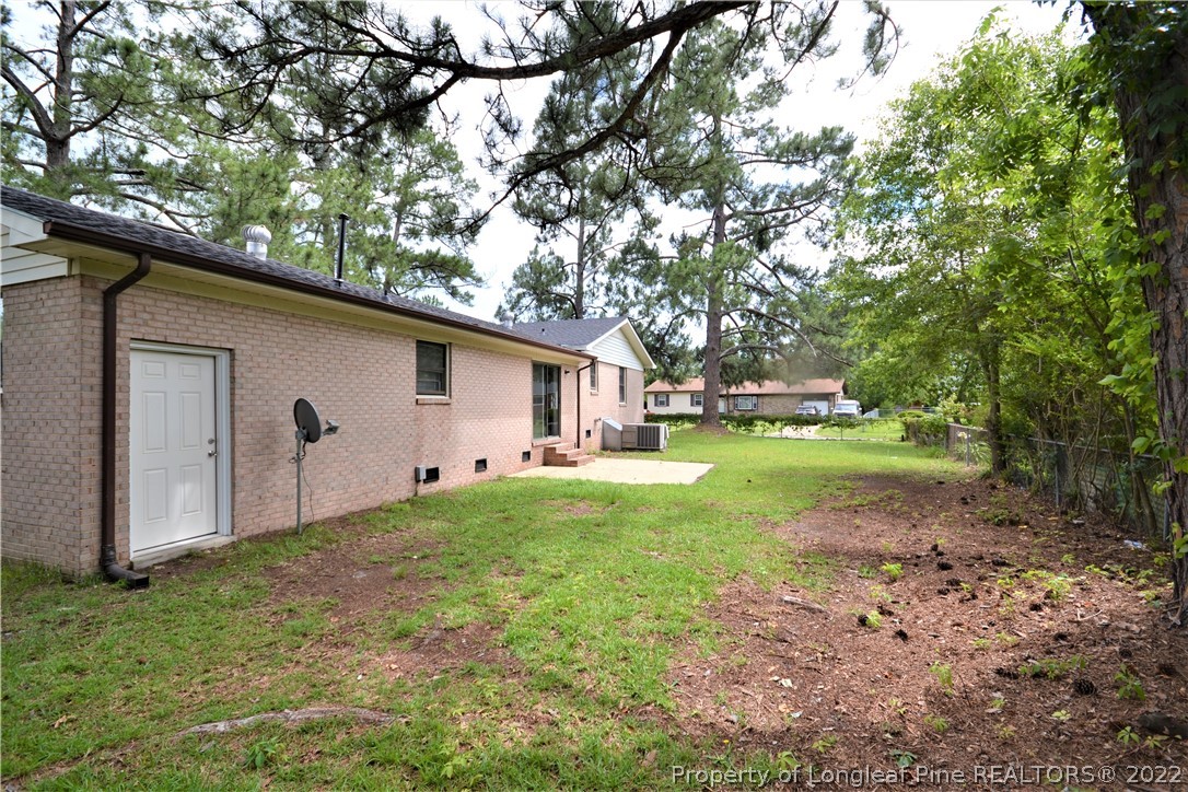 5201 Brookfield Road Fayetteville, NC 28303 - Photo 43 of 45 a front view of house with yard and green space