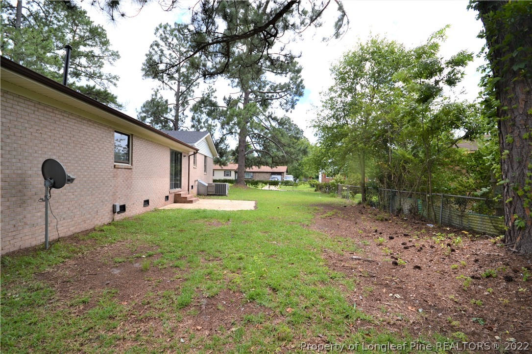 5201 Brookfield Road Fayetteville, NC 28303 - Photo 44 of 45 a view of a house with backyard and garden