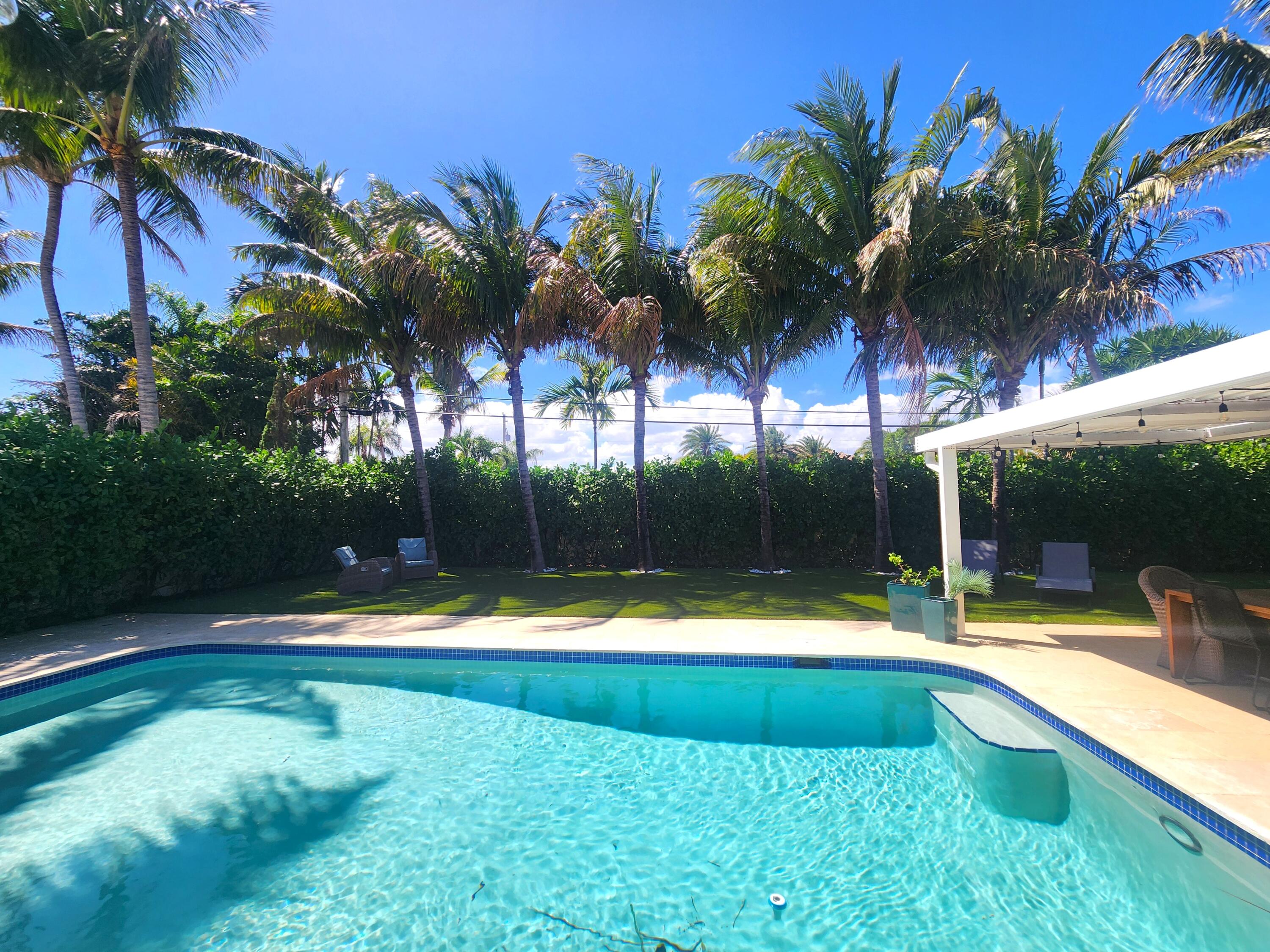 3481 Northeast 31st Avenue Lighthouse Point, FL 33064 - Photo 26 of 27 a view of a backyard