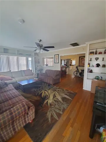 a view of a living room and dining room