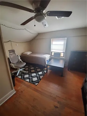 a kitchen with stainless steel appliances granite countertop a stove and a refrigerator