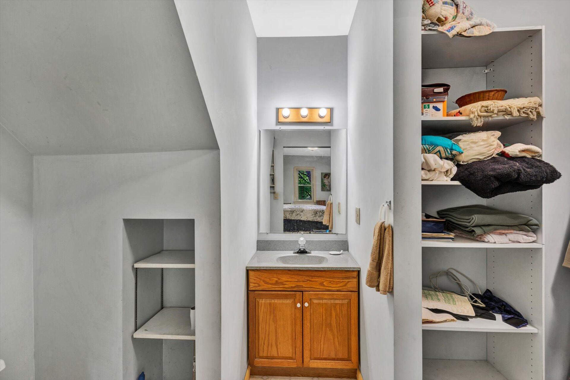 953 Huffville Road Northeast Pilot, VA 24138 - Photo 17 of 38 a view of walk in closet with clothes and shoes