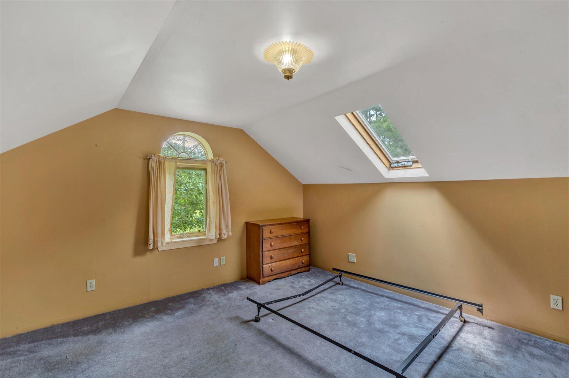 953 Huffville Road Northeast Pilot, VA 24138 - Photo 21 of 38 a view of an empty room with window and wooden floor