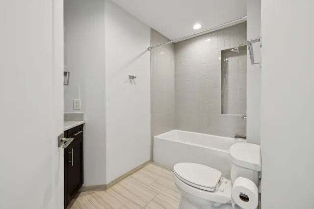 a view of a kitchen with wooden floor