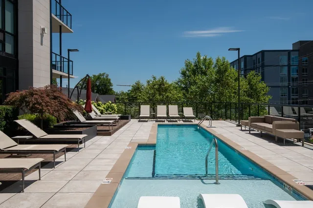 an aerial view of lake residential houses with outdoor space and lake view