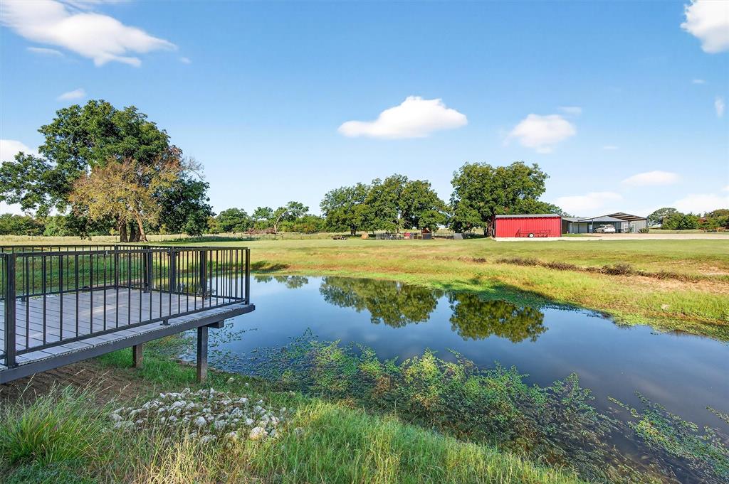 1700 Elmore Road Denison, TX 75021 - Photo 35 of 36 a view of a lake with houses in the back