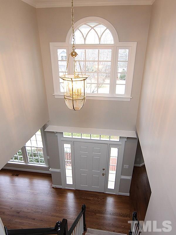 2617 Jasper Lane Raleigh, NC 27613 - Photo 3 of 25 a view of staircase with open dining space