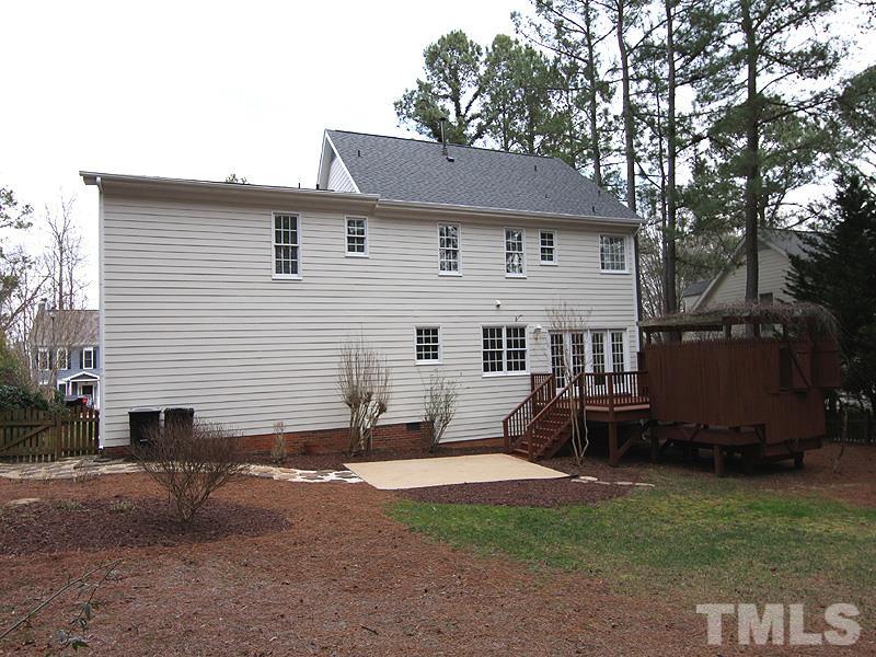 2617 Jasper Lane Raleigh, NC 27613 - Photo 24 of 25 a view of a house with a yard