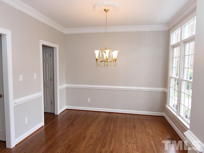 2617 Jasper Lane Raleigh, NC 27613 - Photo 6 of 25 a view of empty room with wooden floor and fan