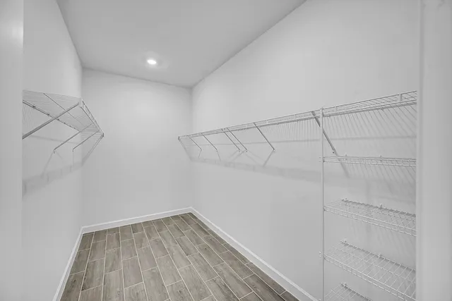 a view of a room with racks on the wall