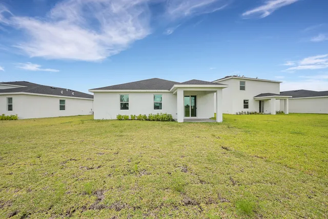 a house view with a garden space