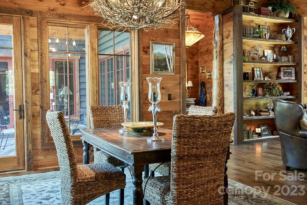 800 Collinsville Road Columbus, NC 28722 - Photo 22 of 33 a dining room with furniture and wooden floor