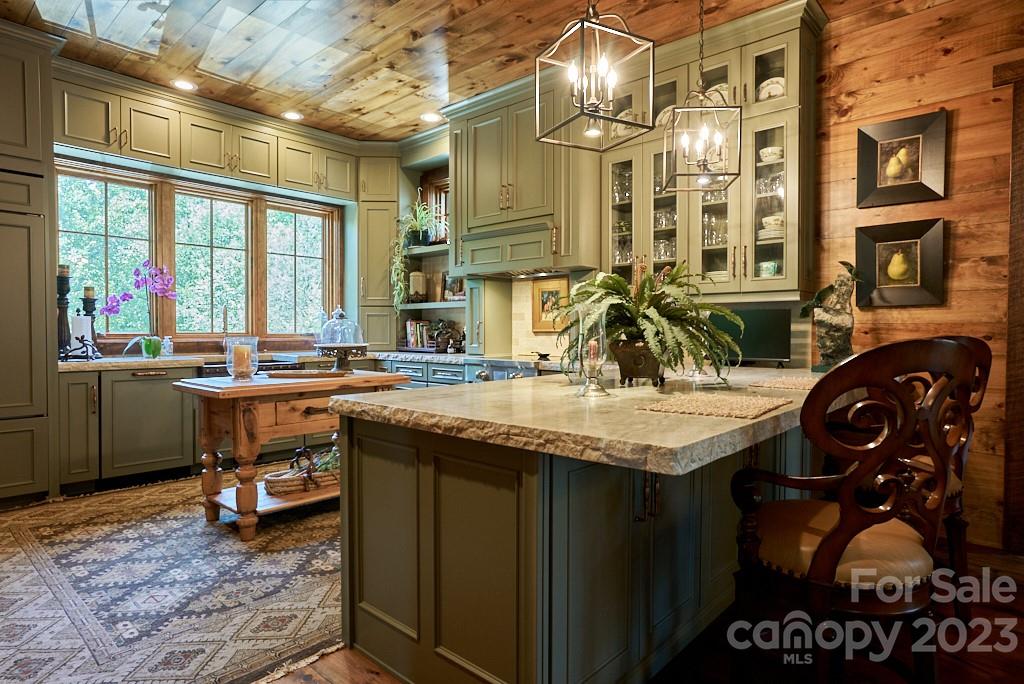 800 Collinsville Road Columbus, NC 28722 - Photo 23 of 33 a kitchen with stainless steel appliances granite countertop a sink and a large window
