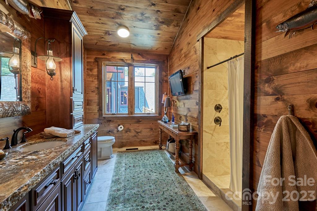800 Collinsville Road Columbus, NC 28722 - Photo 29 of 33 a view of a bathroom with shower and bathtub