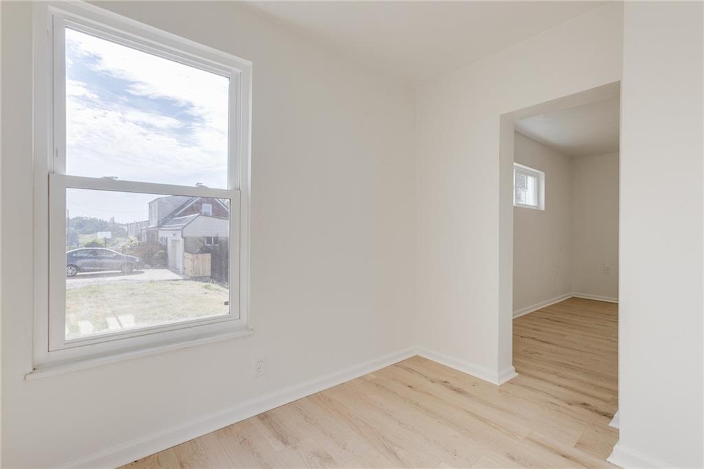 533 Center Hill Road Pittsburgh, PA 15239 - Photo 7 of 31 Living room looking towards entry/front door