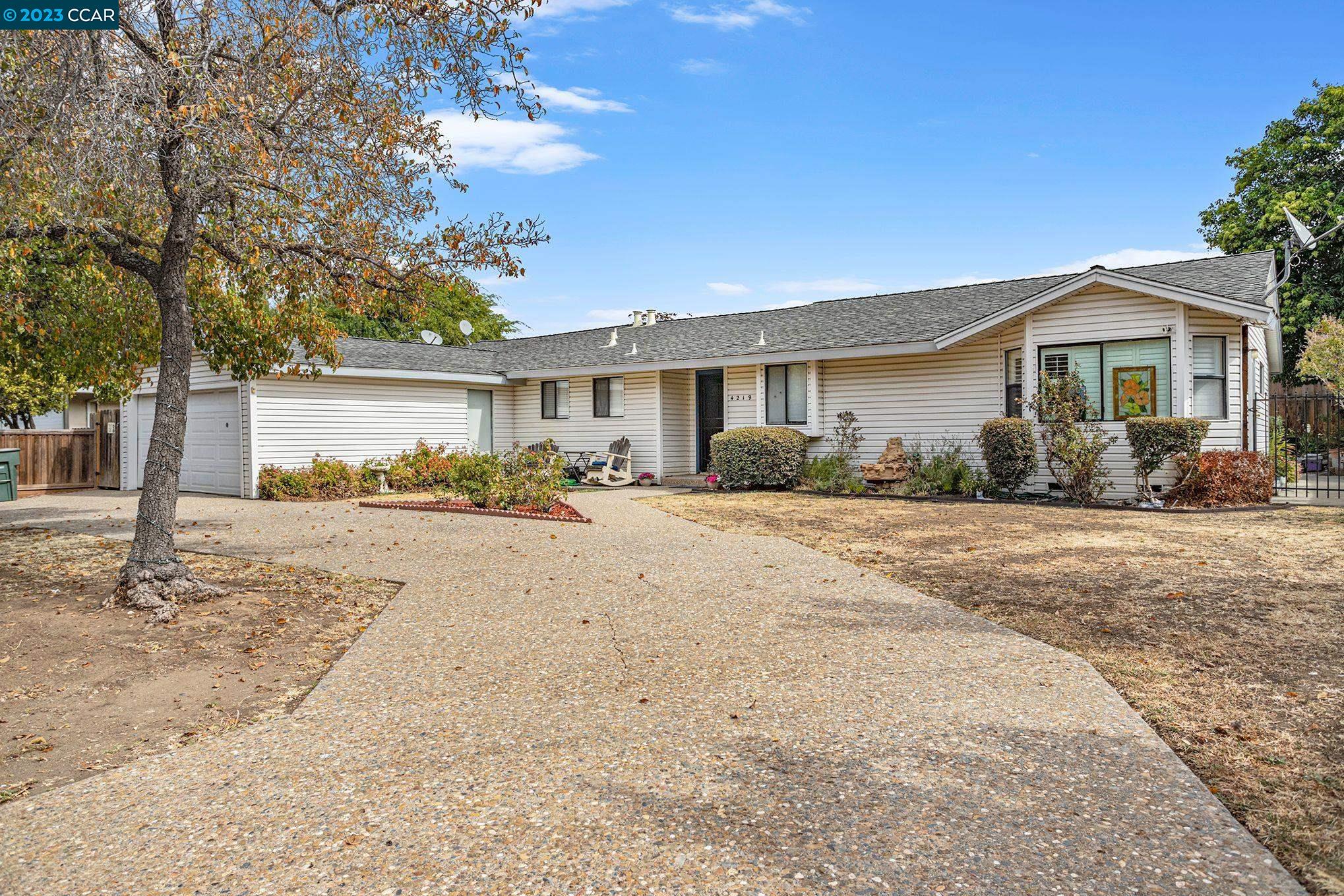 4219 Cowell Road Concord, CA 94518 - Photo 1 of 1 a front view of a house with a yard
