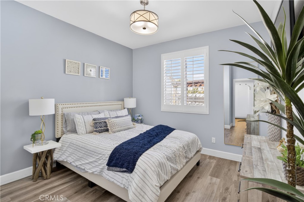 29608 Laredo Circle Menifee, CA 92584 - Photo 18 of 51 a bedroom with bed and a window