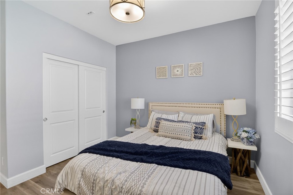 29608 Laredo Circle Menifee, CA 92584 - Photo 19 of 51 a bedroom with a bed and a window