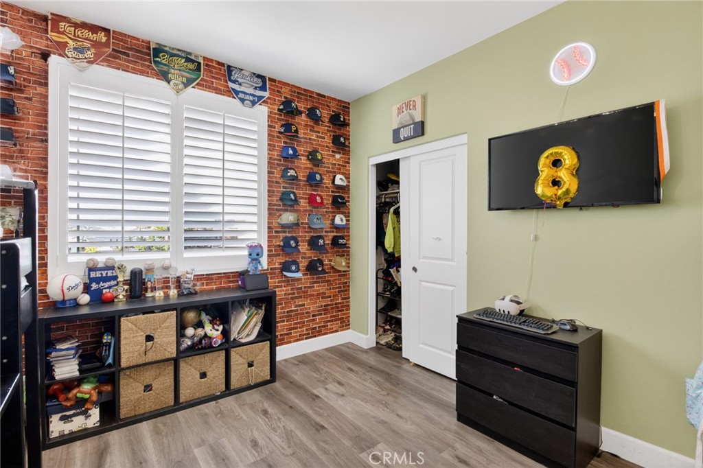 29608 Laredo Circle Menifee, CA 92584 - Photo 31 of 51 a view of a workspace with furniture and a window