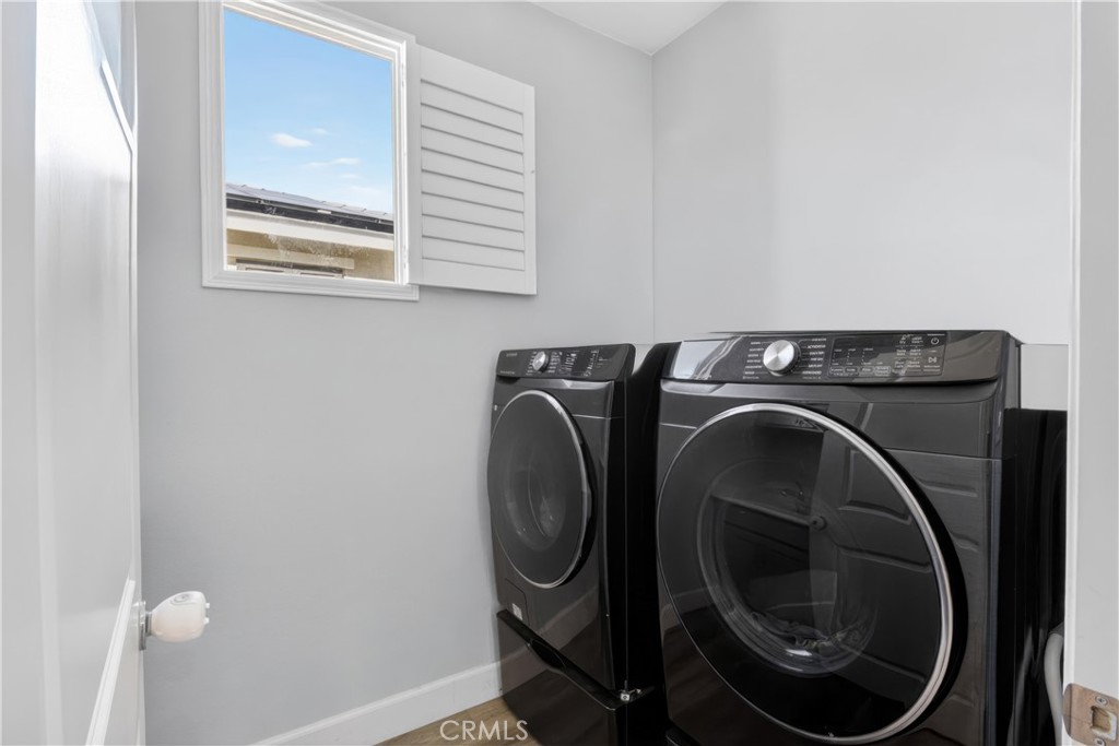 29608 Laredo Circle Menifee, CA 92584 - Photo 33 of 51 a utility room with dryer and washer