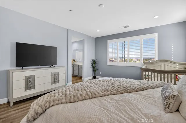 a bathroom with a double vanity sink mirror double and a bathtub