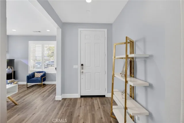 a living room with furniture fireplace and a flat screen tv