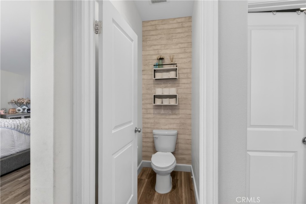 29608 Laredo Circle Menifee, CA 92584 - Photo 43 of 51 a bathroom with a toilet and a shower