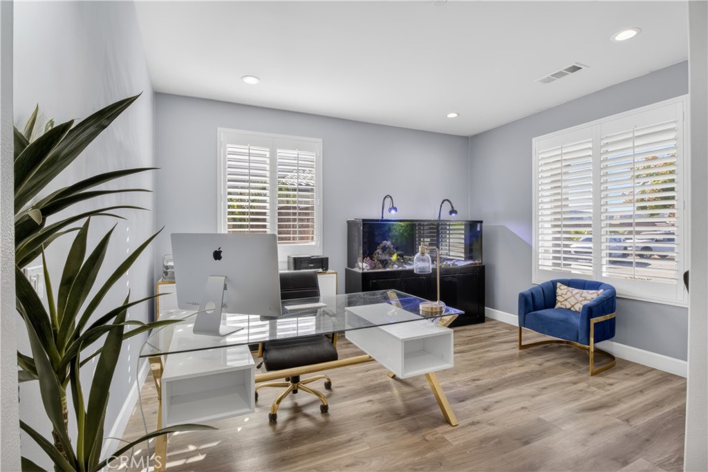 29608 Laredo Circle Menifee, CA 92584 - Photo 5 of 51 a living room with furniture fireplace and a flat screen tv