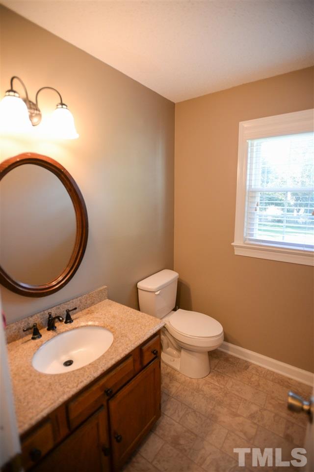 8501 Boot Court Raleigh, NC 27615 - Photo 8 of 21 Main floor half-bath
