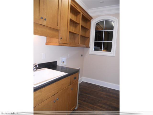 232 Beauchamp Road Advance, NC 27006 - Photo 12 of 16 Laundry Room. Large Laundry Room with Cabinets and Work Sink
