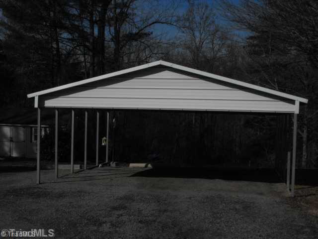 260 Oak Ridge Drive Elkin, NC 28621 - Photo 11 of 16 Parking Lot/Garage. 2 CAR CARPORT