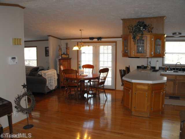 260 Oak Ridge Drive Elkin, NC 28621 - Photo 15 of 16 Dining Room. OPEN FLOOR PLAN WITH HIGH CEILINGS