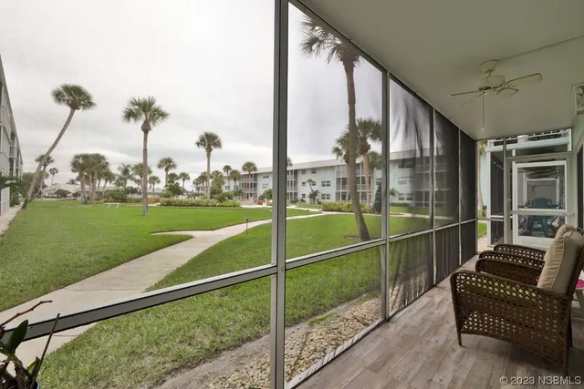 a view of a backyard with a large window